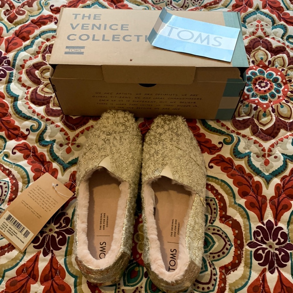 Toms shoes in gold and cream. New with tag